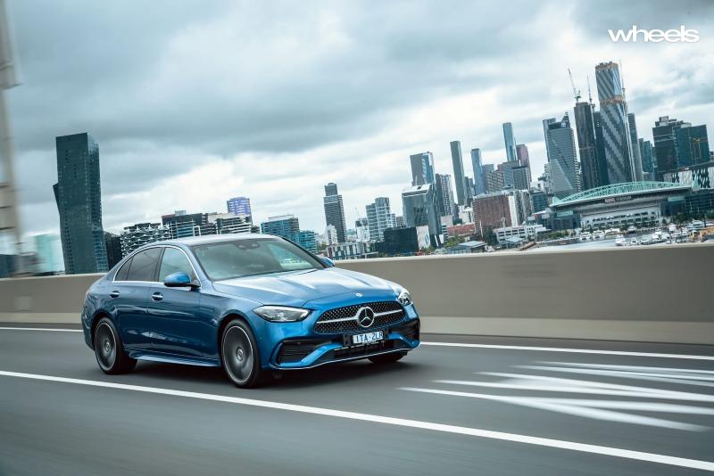 2022_Mercedes-Benz_C300_Spectral_Blue_Metallic_Australia_dynamic_front_28.jpg