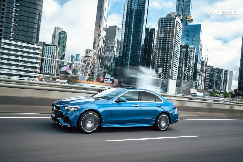 2022_Mercedes-Benz_C300_Spectral_Blue_Metallic_Australia_dynamic_front_26.jpg