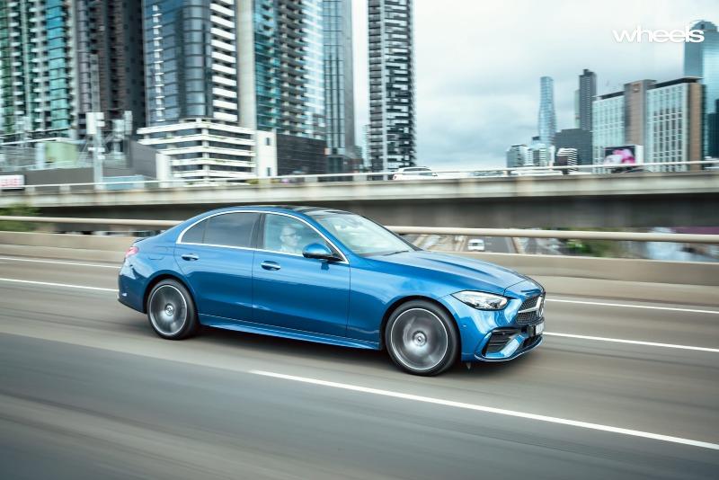 2022_Mercedes-Benz_C300_Spectral_Blue_Metallic_Australia_dynamic_front_31.jpg