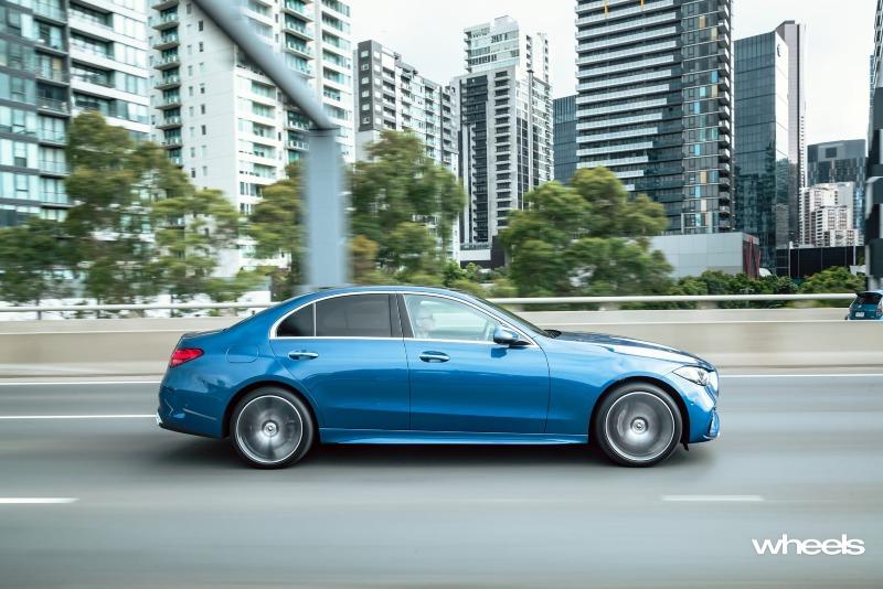 2022_Mercedes-Benz_C300_Spectral_Blue_Metallic_Australia_dynamic_side_17.jpg