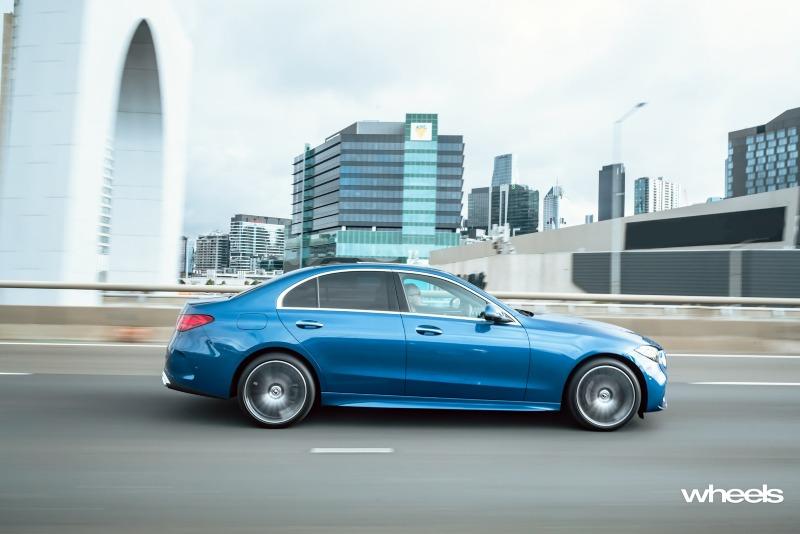 2022_Mercedes-Benz_C300_Spectral_Blue_Metallic_Australia_dynamic_side_16.jpg
