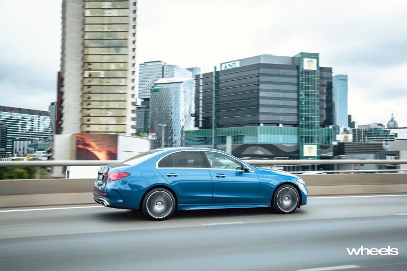2022_Mercedes-Benz_C300_Spectral_Blue_Metallic_Australia_dynamic_side_18.jpg
