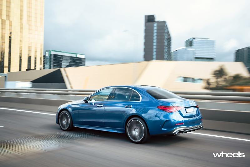 2022_Mercedes-Benz_C300_Spectral_Blue_Metallic_Australia_dynamic_rear_19.jpg