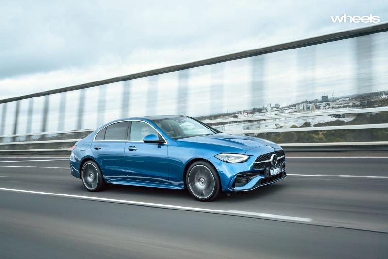2022_Mercedes-Benz_C300_Spectral_Blue_Metallic_Australia_dynamic_front_29.jpg