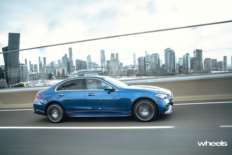 2022_Mercedes-Benz_C300_Spectral_Blue_Metallic_Australia_dynamic_side_14.jpg