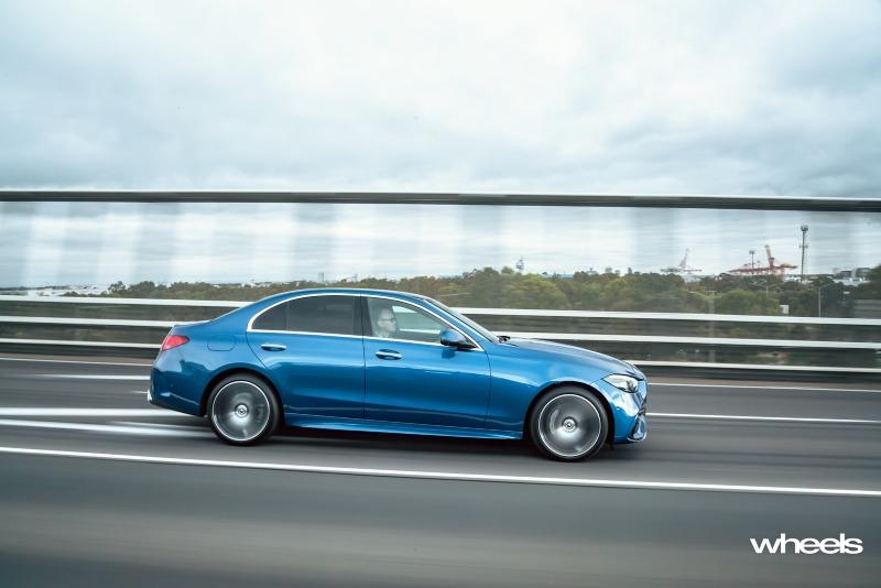 2022_Mercedes-Benz_C300_Spectral_Blue_Metallic_Australia_dynamic_side_15.jpg