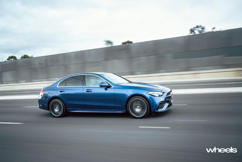 2022_Mercedes-Benz_C300_Spectral_Blue_Metallic_Australia_dynamic_side_11.jpg