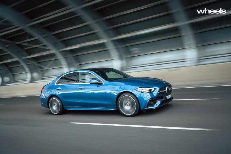 2022_Mercedes-Benz_C300_Spectral_Blue_Metallic_Australia_dynamic_front_30.jpg