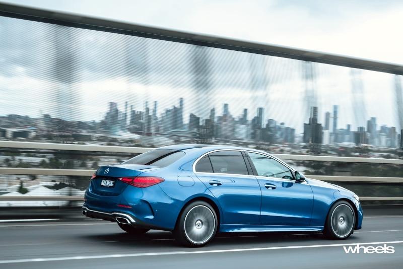2022_Mercedes-Benz_C300_Spectral_Blue_Metallic_Australia_dynamic_rear_18.jpg
