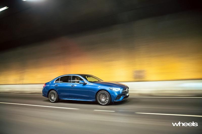 2022_Mercedes-Benz_C300_Spectral_Blue_Metallic_Australia_dynamic_side_19.jpg