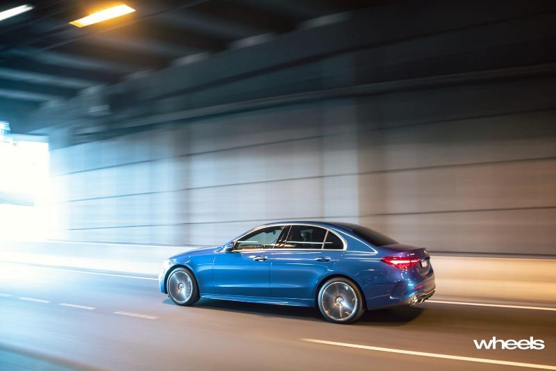 2022_Mercedes-Benz_C300_Spectral_Blue_Metallic_Australia_dynamic_side_22.jpg