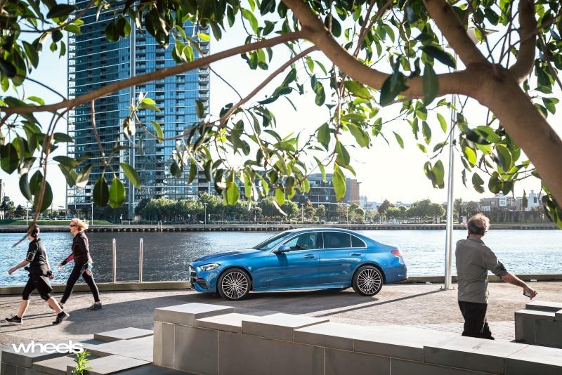 2022_Mercedes-Benz_C300_Spectral_Blue_Metallic_Australia_static_side_04.jpg