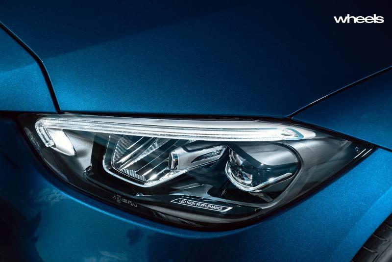 2022_Mercedes-Benz_C300_Spectral_Blue_Metallic_Australia_detail_headlight.jpg