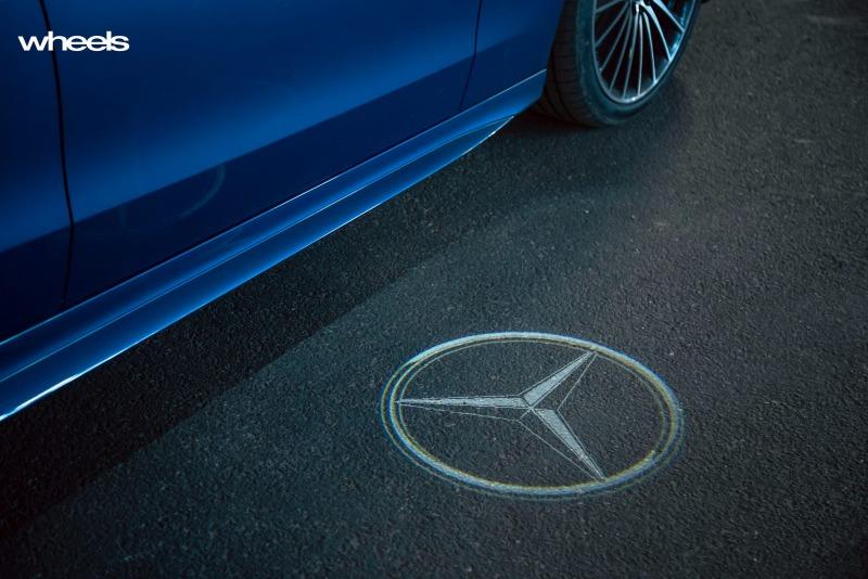 2022_Mercedes-Benz_C300_Spectral_Blue_Metallic_Australia_detail_puddle_light_badge.jpg