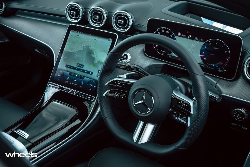 2022_Mercedes-Benz_C300_Spectral_Blue_Metallic_Australia_interior_dashboard.jpg