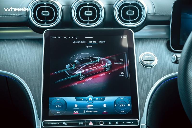 2022_Mercedes-Benz_C300_Spectral_Blue_Metallic_Australia_interior_infotainment_screen_drive_mode_sport_setting.jpg