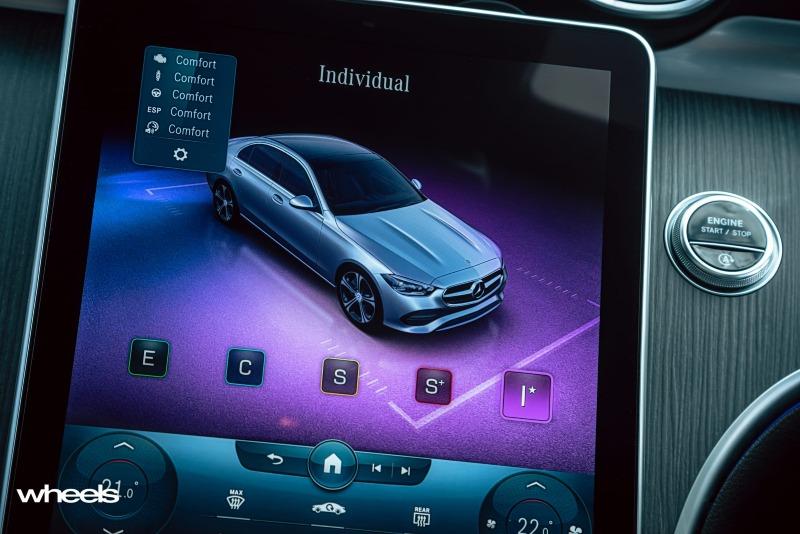 2022_Mercedes-Benz_C300_Spectral_Blue_Metallic_Australia_interior_infotainment_screen_individual_drive_mode_setting.jpg