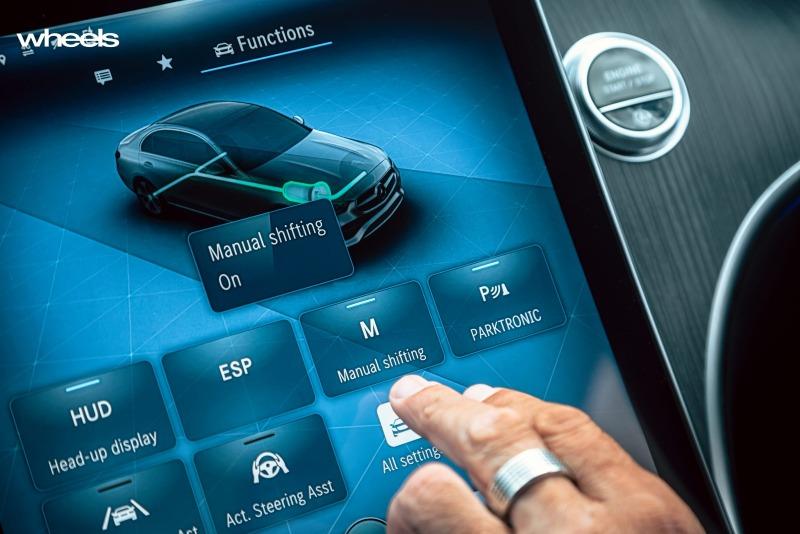 2022_Mercedes-Benz_C300_Spectral_Blue_Metallic_Australia_interior_infotainment_screen_manual_shifting_menu.jpg