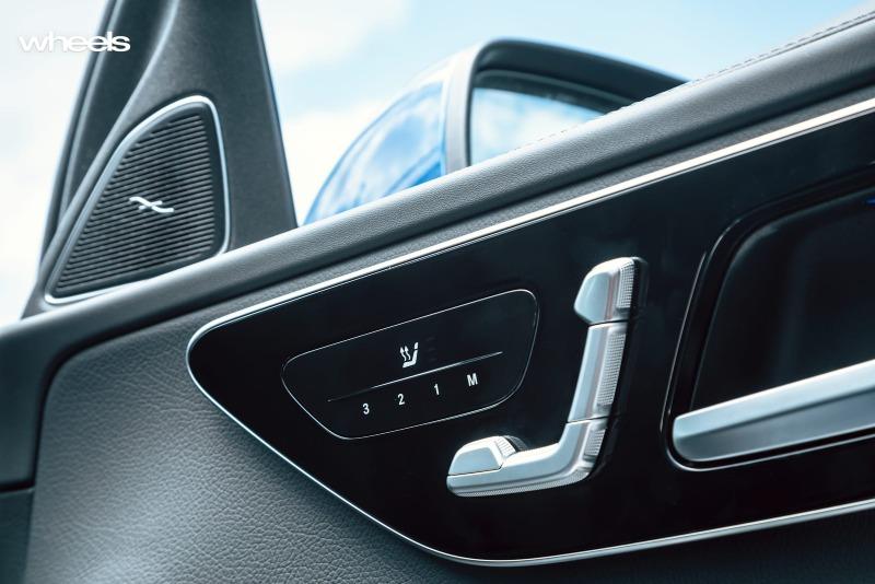 2022_Mercedes-Benz_C300_Spectral_Blue_Metallic_Australia_interior_driver_seat_adjustment_switch_01.jpg
