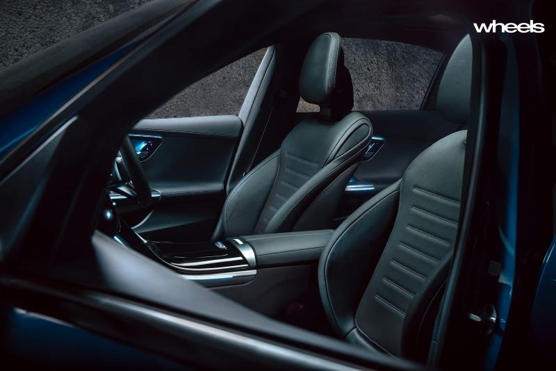 2022_Mercedes-Benz_C300_Spectral_Blue_Metallic_Australia_interior_front_seats.jpg