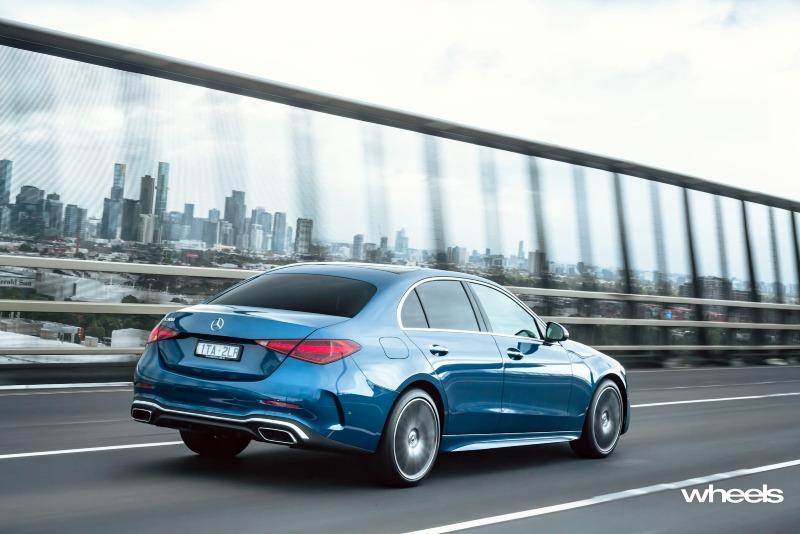 2022_Mercedes-Benz_C300_Spectral_Blue_Metallic_Australia_dynamic_rear_17.jpg