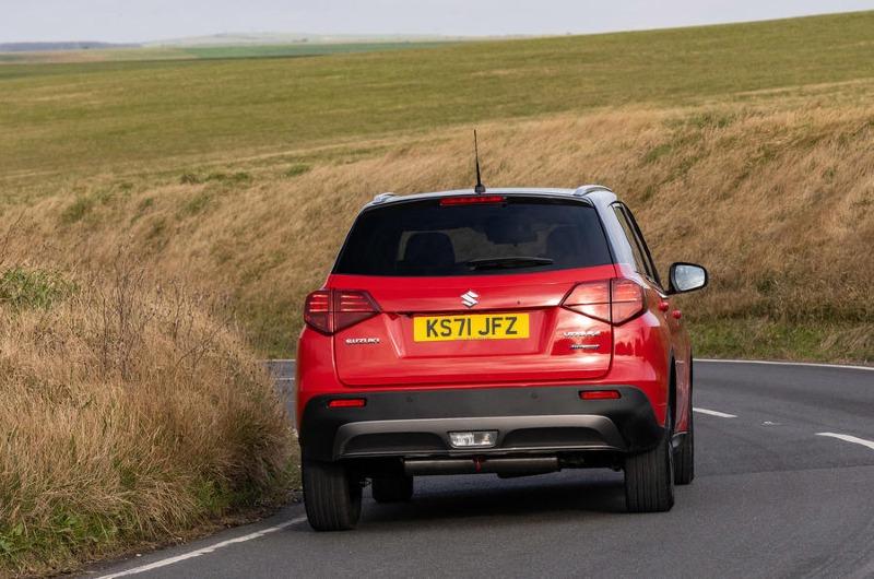 24-suzuki-vitara-full-hybrid-2022-uk-first-drive-review-cornering-rear.jpg
