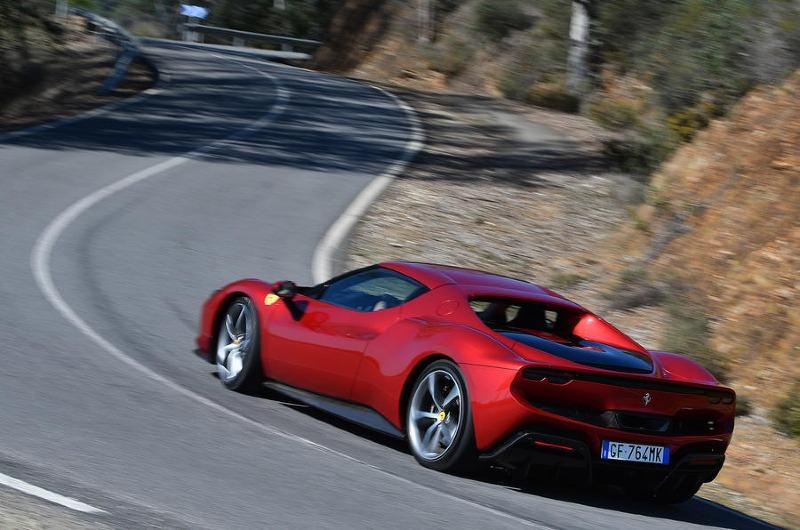 21-ferrari-296-gtb-2022-first-drive-review-cornering-rear.jpg