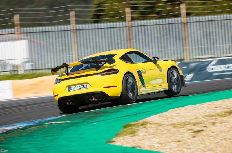 28-porsche-718-cayman-gt4-rs-2022-first-drive-cornering-rear.jpg