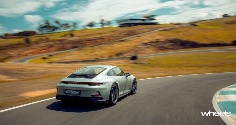 2022_Porsche_911_GT3_Touring_70_years_Porsche_Australia_Edition_Australia_dynamic_rear_02_ABrook.jpg