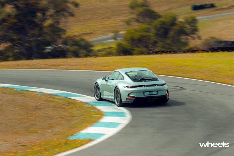 2022_Porsche_911_GT3_Touring_70_years_Porsche_Australia_Edition_Australia_dynamic_rear_04_ABrook.jpg