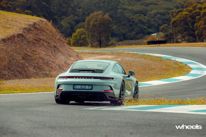 2022_Porsche_911_GT3_Touring_70_years_Porsche_Australia_Edition_Australia_dynamic_rear_05_ABrook.jpg