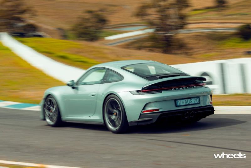 2022_Porsche_911_GT3_Touring_70_years_Porsche_Australia_Edition_Australia_dynamic_rear_03_ABrook.jpg