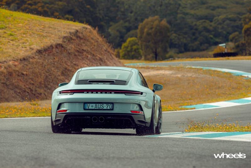 2022_Porsche_911_GT3_Touring_70_years_Porsche_Australia_Edition_Australia_dynamic_rear_07_ABrook.jpg
