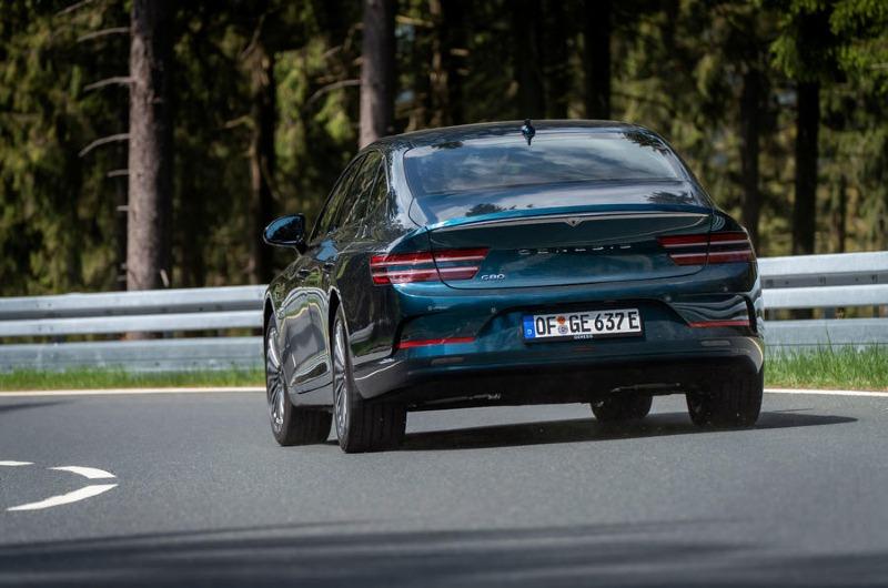 021-genesis-g80-ev-cornering-rear-2022.jpg