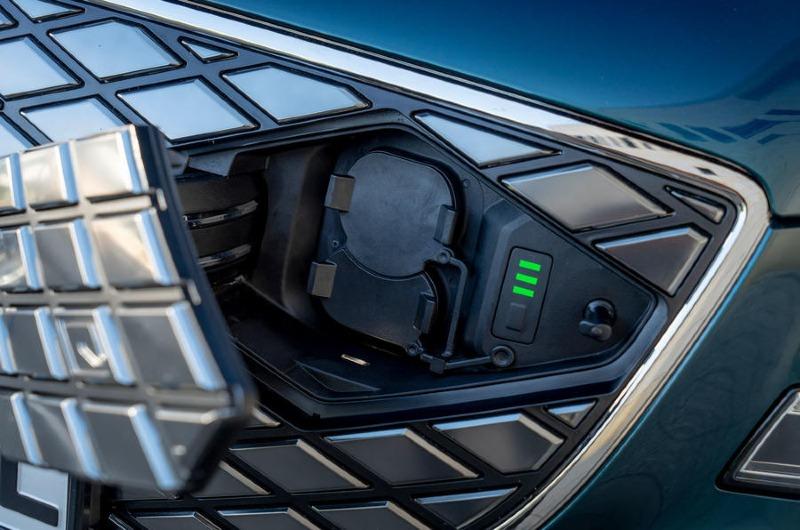 026-genesis-g80-ev-charging-port-2022.jpg