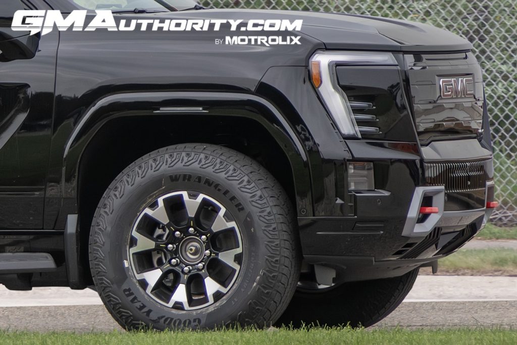 2025-GMC-Sierra-EV-AT4-Prototype-Spy-Shots-July-2024-Exterior-004-side-front-fascia-Goodyear-Wrangler-Territory-AT-tire-18-Inch-wheel-1024x683.jpg