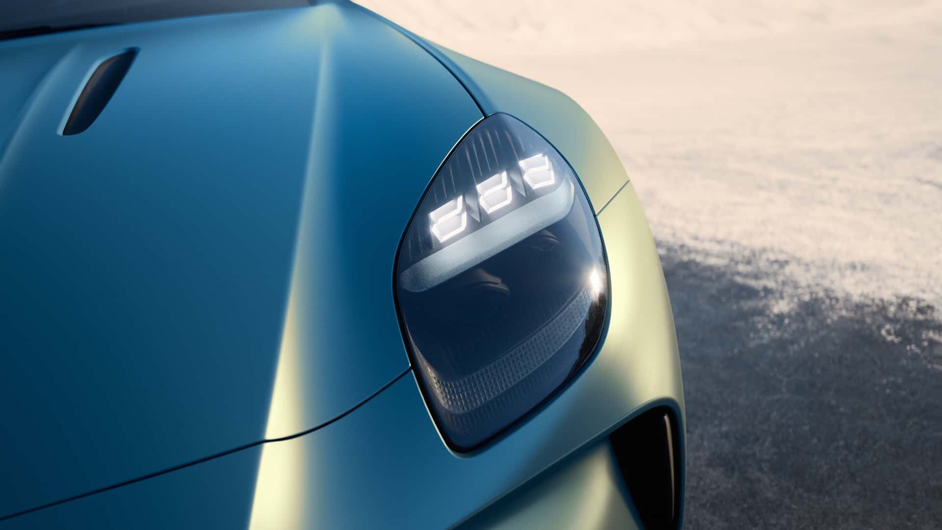 aston-martin-vantage-roadster-headlight.jpg