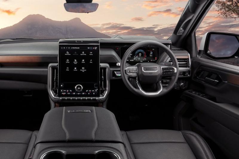 2025-GMC-Yukon-Denali-Australia-Press-Photo-Interior-002-cockpit-dash-steering-wheel-center-stack-infotainment-display-screen-center-console.jpg