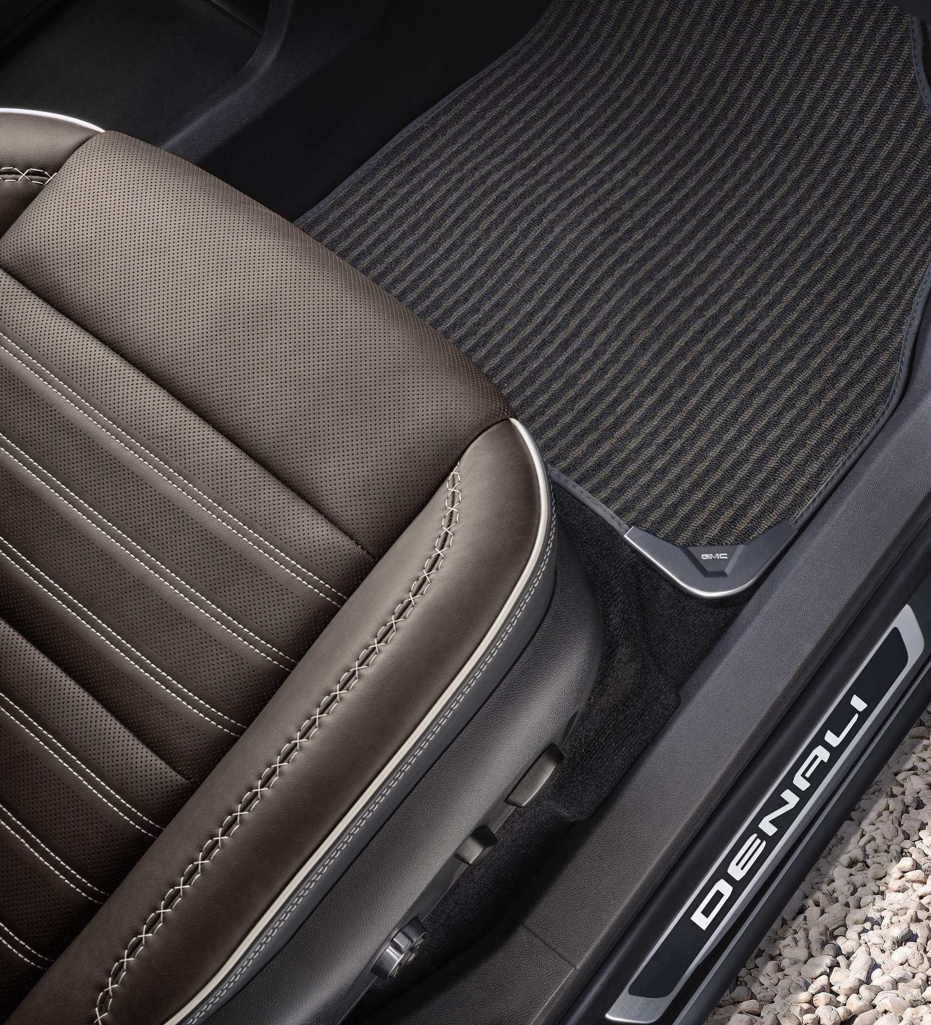 2026-GMC-Acadia-Denali-Ultimate-Press-Photos-Interior-008-seat-bottom-floorboard-Denali-door-sill-plate.jpg
