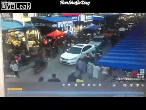 Truck driver plows into a crowded market place.gif